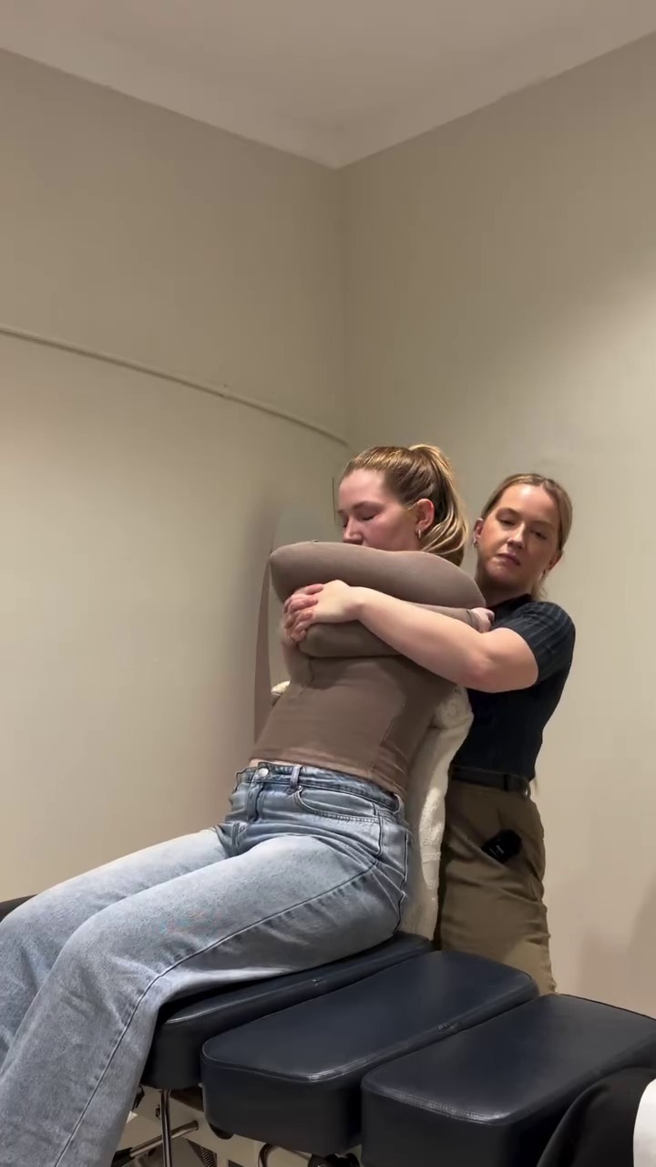 Hands-on spinal adjustment and thoracic mobilization